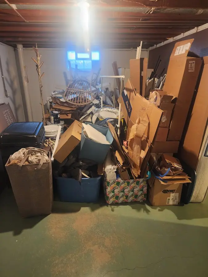 Roll-off dumpster container at job site for 2 Yard Dumpster Rental in New Port Richey